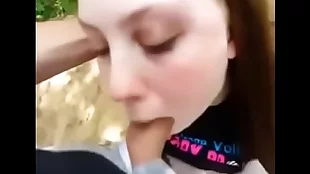 Slurping teen blows outdoors. Gets nice cum on her face